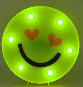 a green smiley face with lights on it whatsapp dp wallpaper