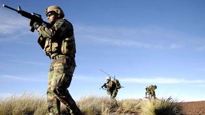 a group of soldiers are standing on a hill indian army wallpaper