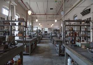 a large laboratory with many bottles and jars Wallpaper