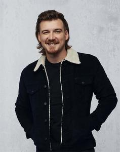 a man in a black jacket and black shirt smiling morgan wallen wallpaper