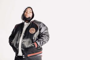 a man in a black jacket and hoodie rod wave wallpaper