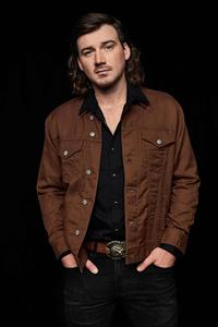 a man in a brown jacket posing for a photo morgan wallen wallpaper