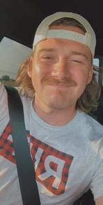 a man in a plaid shirt is taking a selfie in his car morgan wallen wallpaper