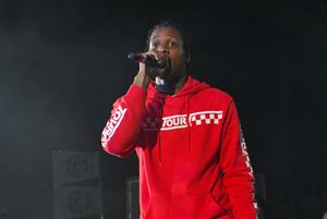a man in a red sweatshirt singing into a microphone lil durk wallpaper