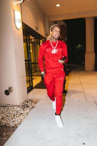 a man in red walking down the sidewalk lil durk wallpaper