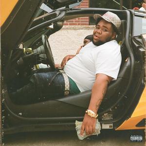 a man sitting in the back seat of a yellow car rod wave wallpaper