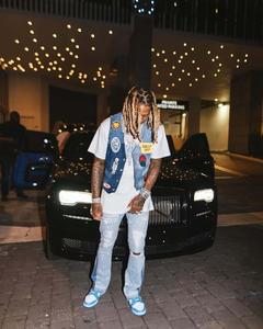a man standing next to a black car lil durk wallpaper
