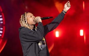 a man with dreadlocks is holding a microphone lil durk wallpaper