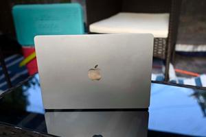 A modern laptop and coffee on a wooden desk laptop wallpaper