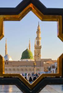 a mosque with a golden frame in the background islamic wallpaper