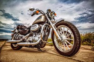 a motorcycle parked on a dirt road motorcycle wallpaper