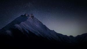 a mountain with stars above it at night dark wallpaper