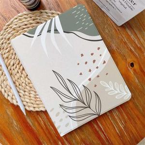 a notebook with a leaf design on it aesthetic ipad wallpaper