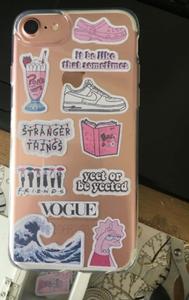 a phone case with stickers on it Wallpaper