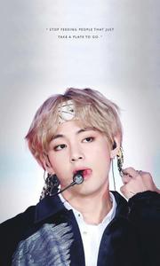 a poster with a picture of a man with a microphone bts v wallpaper