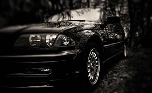 A Reflecive Brand-New Black Car car wallpaper