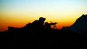 a silhouette of a soldier on top of a mountain indian army wallpaper