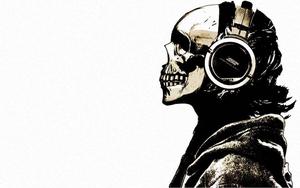 A skull adorned with headset, showing technology is here to stay skull wallpaper