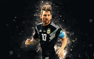 a soccer player is running with a ball messi wallpaper