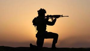 a soldier is silhouetted at sunset indian army wallpaper