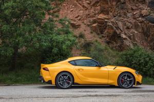 A stunning Toyota Supra sports car on display in a picturesque landscape. supra wallpaper
