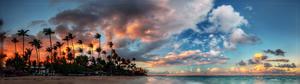 a sunset with palm trees and clouds on the beach dual monitor wallpaper