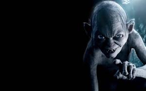 a troll is shown with his finger pointed lord of the rings wallpaper
