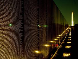 A veteran pays his respects at the Vietnam Veterans Memorial during a Memorial Day ceremony. memorial day wallpaper