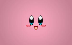A vibrant pink-colored Kirby looks happy and friendly, inviting us to join the adventure. kirby wallpaper