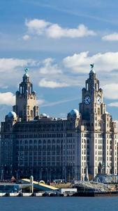 A view of the colorful buildings and the waterside of Liverpool liverpool wallpaper