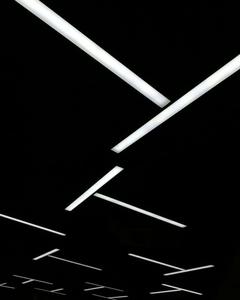 a white ceiling with white lines on it oled wallpaper