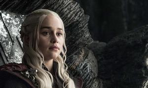 a white haired woman sitting in a rock game of thrones wallpaper