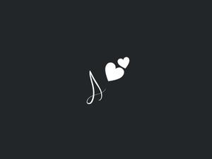 a white heart with a note on it name wallpaper