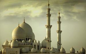 a white mosque with a cloudy sky islamic wallpaper