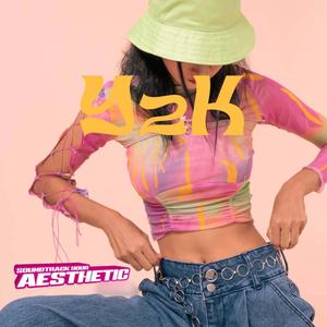 a woman in a hat and jeans is posing for a photo y2k aesthetic wallpaper