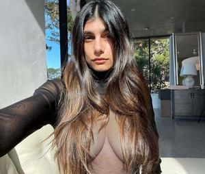 a woman in a sheer top and a long hair mia khalifa wallpaper