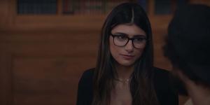 a woman in glasses is talking to another woman mia khalifa wallpaper