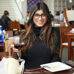 a woman with long hair mia khalifa wallpaper