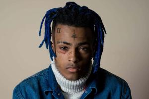 a young man with blue dreadlocks and a blue jacket xxxtentacion wallpaper