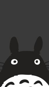 Adorable Black Kitten Looking Curiously at the Camera Wallpaper