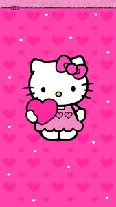 Adorable Hello Kitty enjoys warm summer day Wallpaper