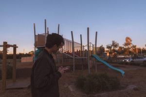 Aesthetic Boy At Playground aesthetic boy wallpaper