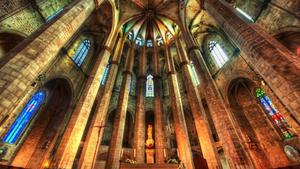 An orange sunset over the grand architecture of Barcelona barcelona wallpaper