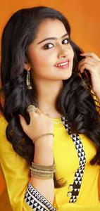 Anupama Parameswaran Orange Background anupama parameswaran wallpaper