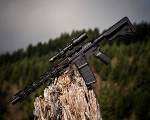 Assault Rifle On Brown Wood gun wallpaper