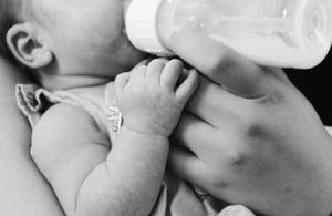 Baby Boy Feeding baby boy wallpaper