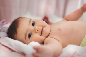 Baby Boy Laying On Bed baby boy wallpaper