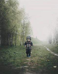 Baby Boy Walking On Grassy Landscape baby boy wallpaper