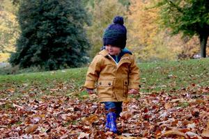 Baby Boy Wearing Cozy Brown Jacket baby boy wallpaper