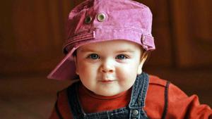 Baby Boy Wearing Pink Hat baby boy wallpaper